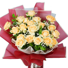 Elegant peach rose bouquet with greenery and baby's breath, ideal for flower delivery in Singapore