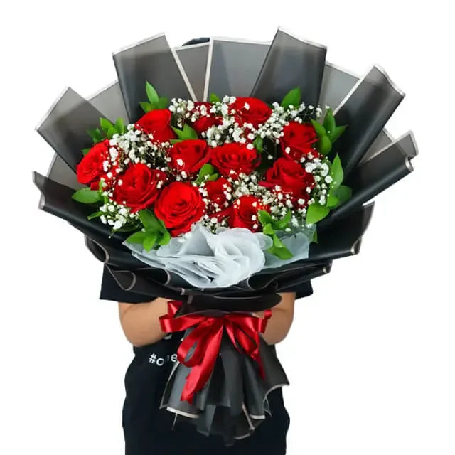 Red rose bouquet with baby's breath and greenery, ideal for flower delivery gifts