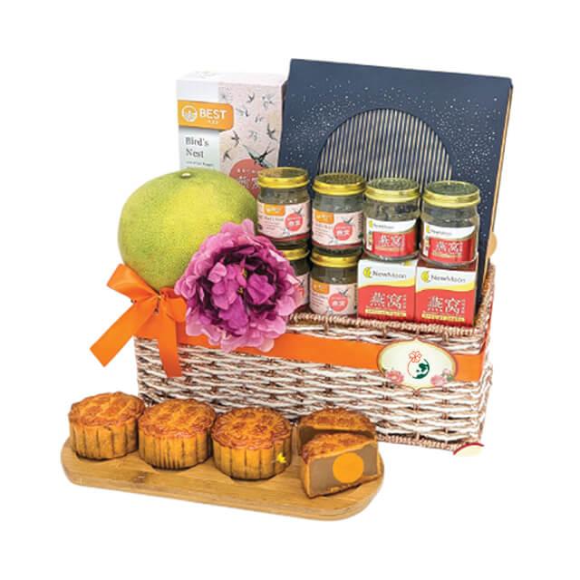 Flower delivery gift basket with pink flower, fruit, bird's nest jars and traditional mooncakes