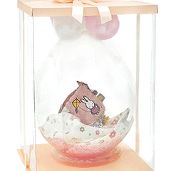 Floral-themed gift hamper with plush toy and flower blanket in clear box, ideal for flower delivery.