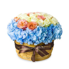 Mixed flower basket with blue hydrangeas and roses for fresh flower delivery in Singapore