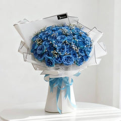 Elegant blue rose bouquet with white accents, perfect for fresh Singapore flower delivery