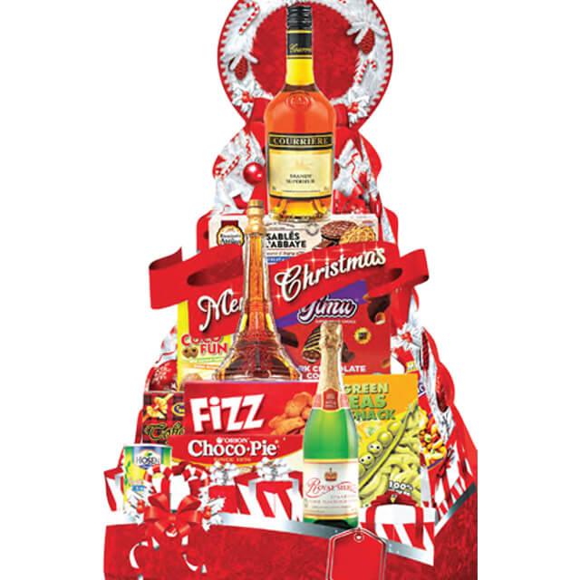 Festive gift hamper with chocolates, snacks, and drinks for holiday flower delivery