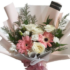 Hand-tied bouquet with pink gerberas and white roses for flower delivery in Singapore