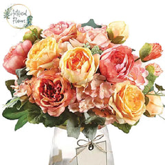 Summer-themed artificial flower bouquet in vase, perfect for flower delivery in Singapore