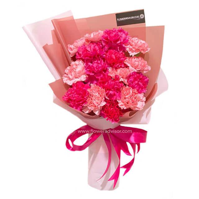 Pink and red carnation bouquet with ribbon, perfect for same-day flower delivery