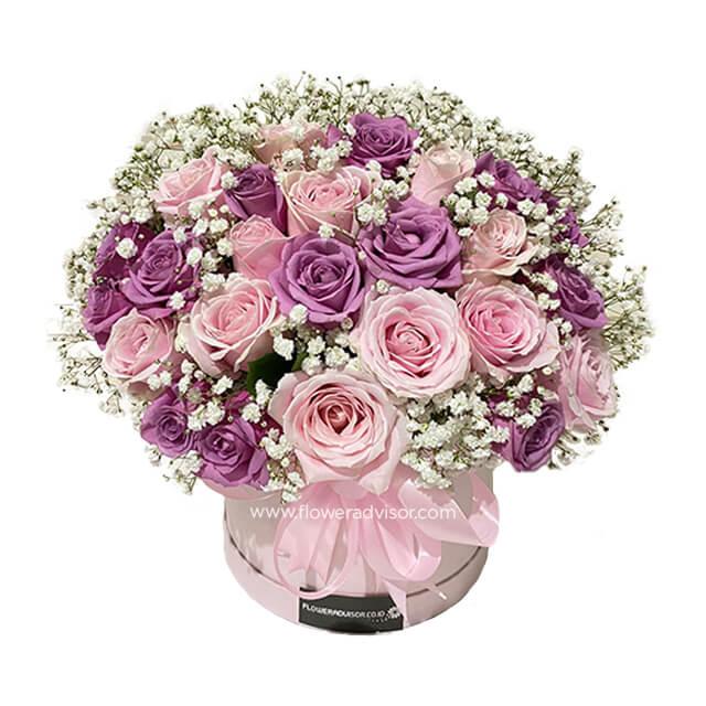 Pink and purple rose bloom box arrangement for flower delivery in Singapore