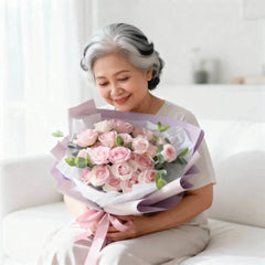 Elderly woman happily receives pink rose bouquet, symbolizing flower delivery service