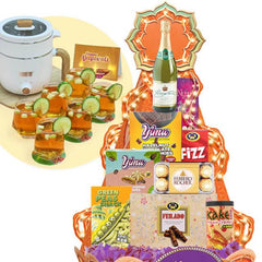 Flower delivery gift hamper with snacks, chocolates, sparkling drink, and festive decoration