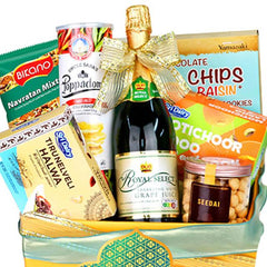 Gourmet gift hamper with snacks and sparkling grape juice, perfect for flower delivery gifts.