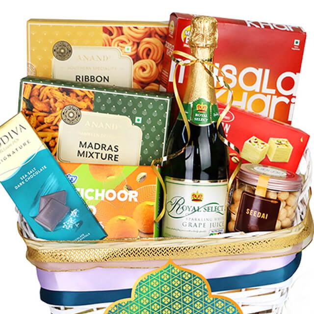 Luxury gourmet gift basket with snacks and grape juice for flower delivery Singapore