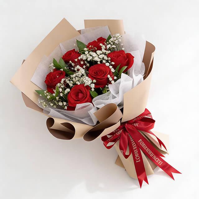 Red rose bouquet with baby's breath and greenery, ideal for flower delivery in Singapore