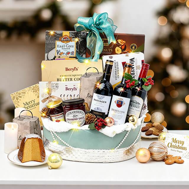 Festive Christmas hamper with wine, cookies, and flowers for holiday gift delivery