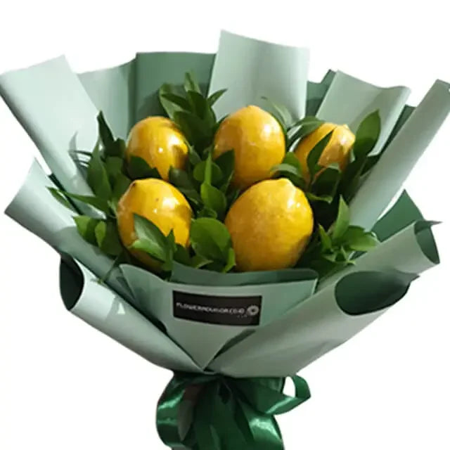 Fresh bouquet with lemons and green leaves, ideal for unique flower delivery gifts