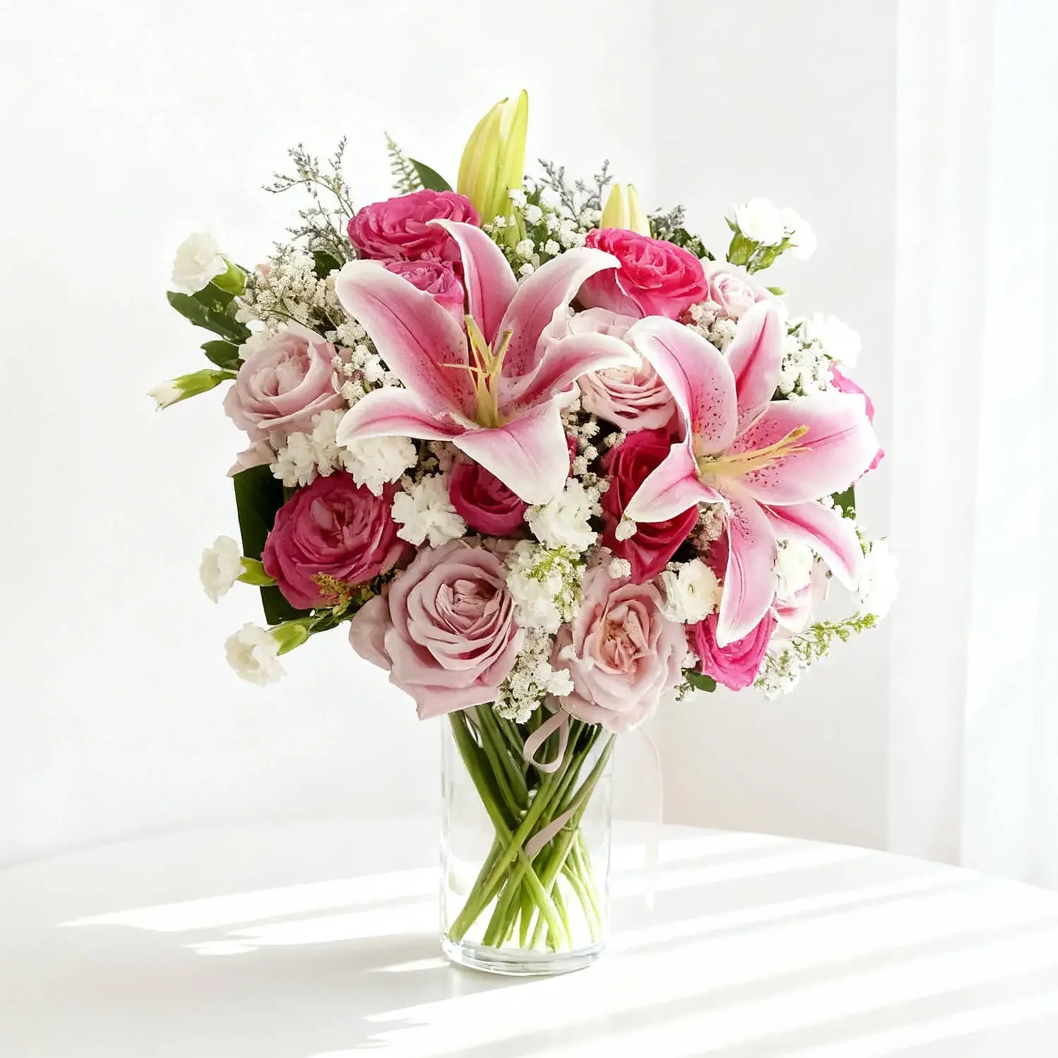 Elegant pink and white flower bouquet in vase for flower delivery in Singapore