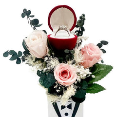 Preserved pink roses bouquet with ring box, ideal for romantic flower delivery gifts