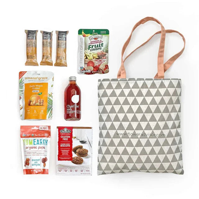 Gift hamper with healthy snacks, tea and tote bag, ideal for floral gift delivery in Singapore