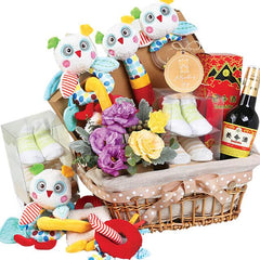 Flower delivery gift basket with fresh flowers, plush toys, and assorted gifts