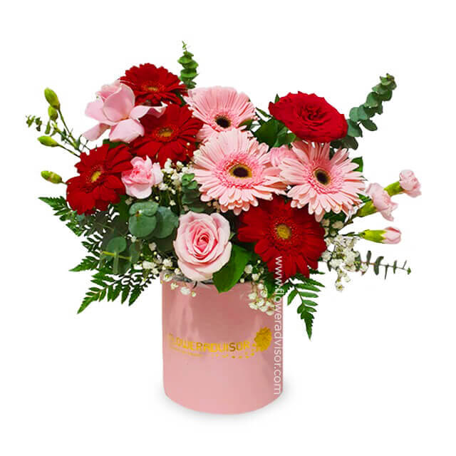 Fresh pink and red flower bouquet in a pink box, perfect for flower delivery in Singapore