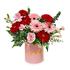 Fresh pink and red flower bouquet in a pink box, perfect for flower delivery in Singapore