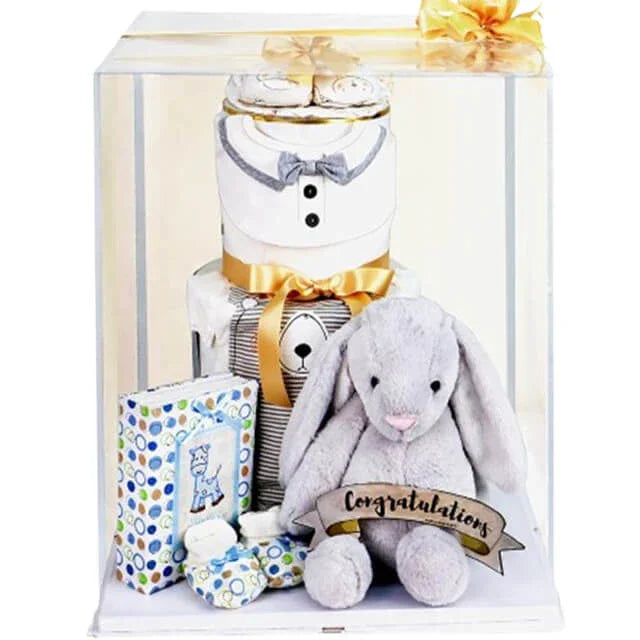 Baby gift set with plush bunny, baby essentials, and congratulatory flower delivery arrangement
