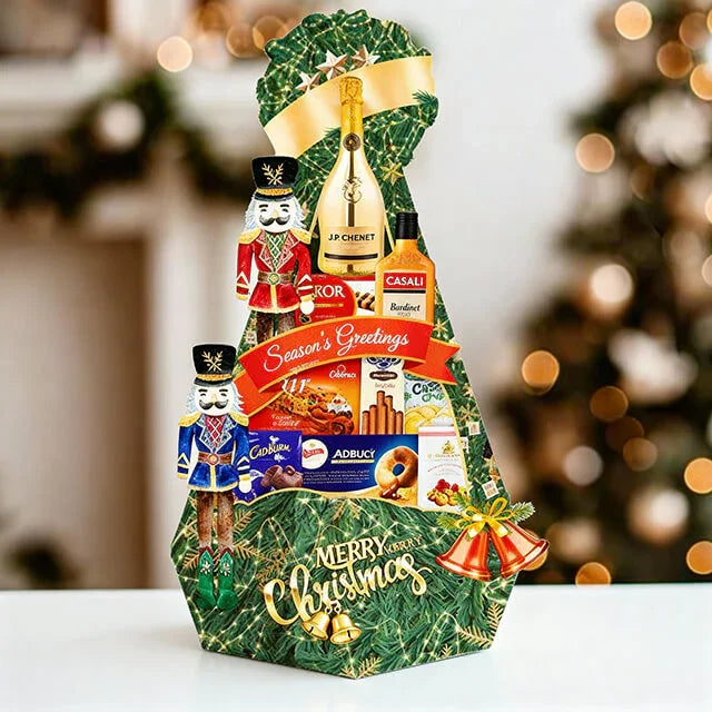 Christmas hamper with champagne, chocolates, cookies, and festive nutcracker decorations, ideal for holiday flower delivery gifts.