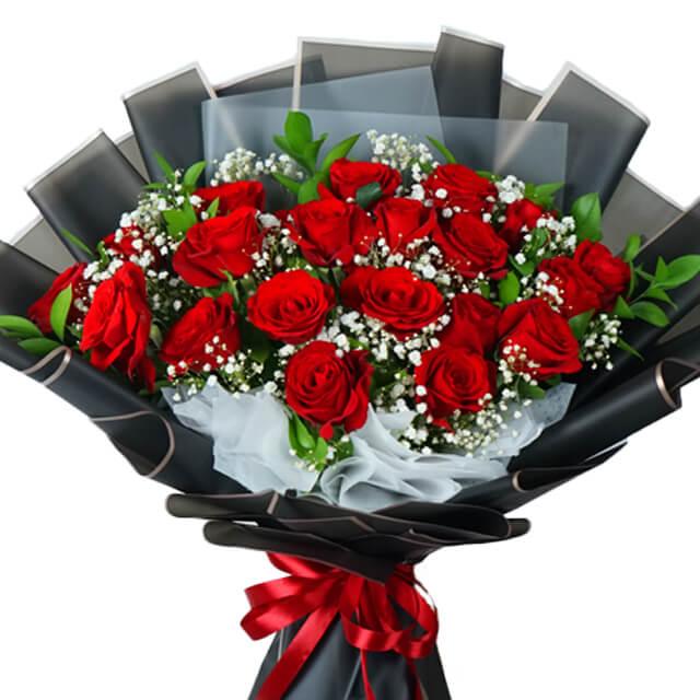 Fresh red rose bouquet with baby's breath, black wrapping and red ribbon for flower delivery