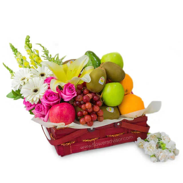 Fresh fruit and flower basket for delivery featuring apples, grapes, gerberas, roses, and lilies