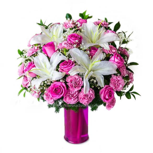 Pink and white flower bouquet in a vase for flower delivery in Singapore