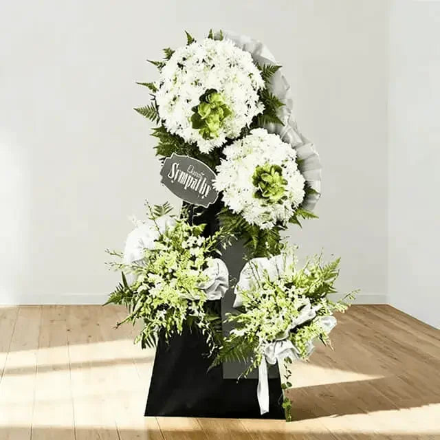 White condolence flower wreath arrangement for Singapore same-day flower delivery