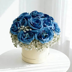 Blue rose flower arrangement in round box for flower delivery in Singapore