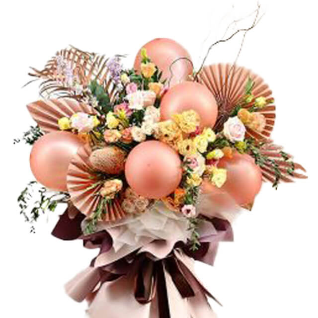 Elegant flower bouquet with roses, eustoma and decorative metallic balloons for delivery