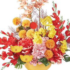 Artificial flower arrangement with red, yellow, and pink blooms in a decorative pot for flower delivery