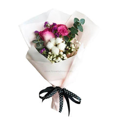 Elegant flower bouquet with pink roses, purple accents, white cotton, ideal for flower delivery