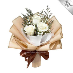 Elegant white rose bouquet with rustic wrapping, ideal for flower delivery in Singapore