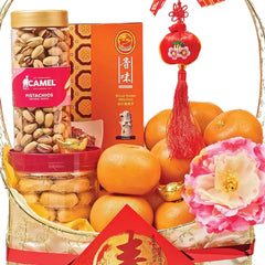 Chinese New Year gift hamper with oranges, pistachios, cookies, flowers, and festive decor, ideal for flower delivery.