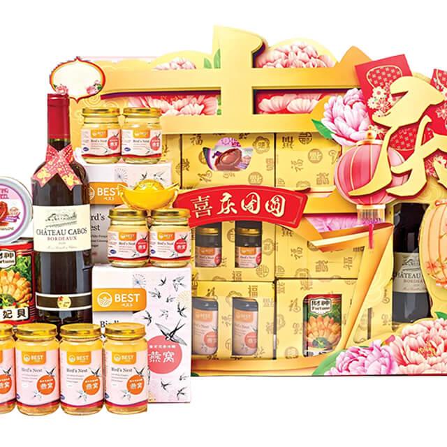 Chinese New Year hamper with wine, snacks, and floral decorations for festive flower delivery