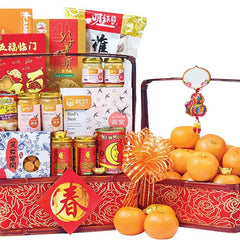 Chinese New Year hamper with festive goodies, mandarin oranges, and gift bow for delivery