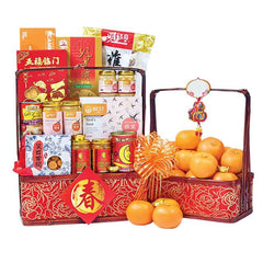 Chinese New Year festive hamper with oranges, snacks, and decorative elements for delivery