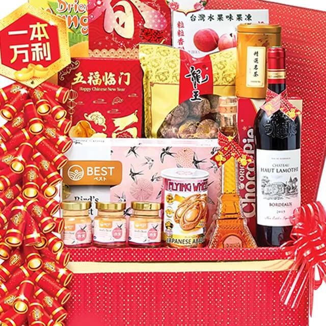 Chinese New Year gift hamper with festive snacks, wine, and red packaging for delivery