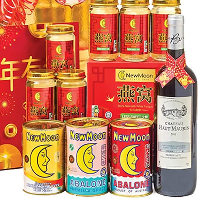 Chinese New Year hamper with wine, canned abalone, bird's nest, festive gift packaging for flower delivery