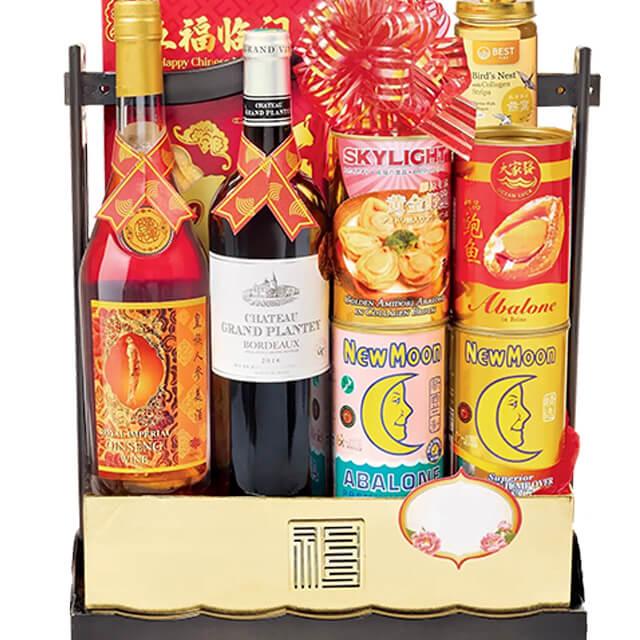 Chinese New Year gift hamper with festive food and wine, flower delivery available