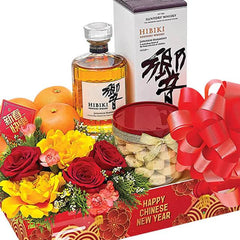 Chinese New Year hamper with fresh flowers, fruits, snacks, and gift for delivery