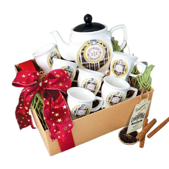 Elegant tea set gift box with teapot, cups, red ribbon, ideal for flower delivery gifting