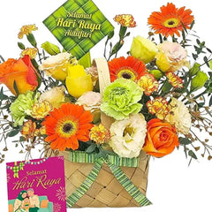 Hari Raya festive flower delivery basket with fresh orange, yellow, green and white blooms