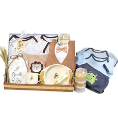Newborn baby gift set with cute clothing and feeding essentials for flower delivery