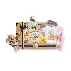 Newborn baby girl gift hamper with soft toys, baby essentials, and a fresh flower bouquet for delivery