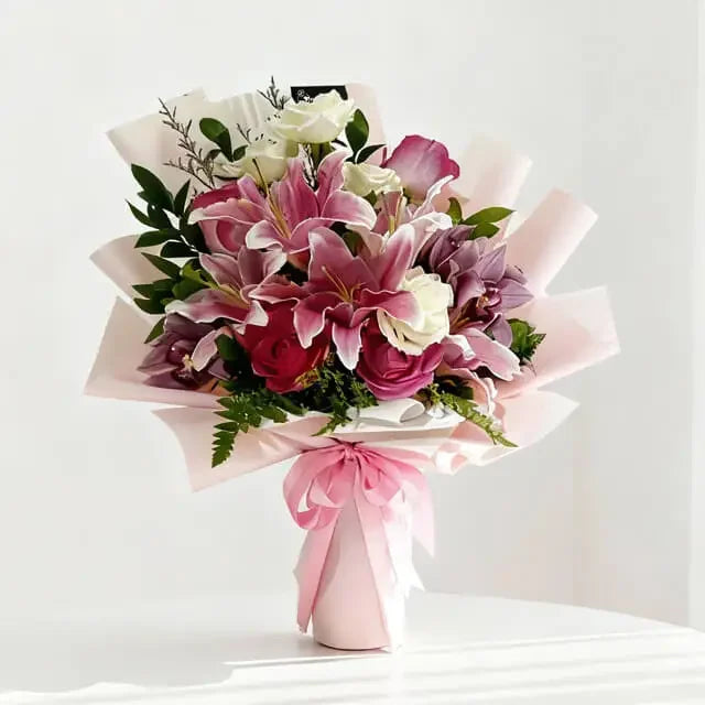 Romantic pink and white flower bouquet with lilies and roses for flower delivery