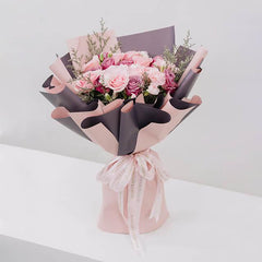 Elegant pink rose bouquet with wrapping, ideal for same-day flower delivery in Singapore