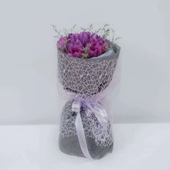 Purple tulip bouquet with decorative wrap, ideal for flower delivery in Singapore